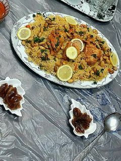 صورة لوصفة اوزي وخلطة الدجاج بالفرن