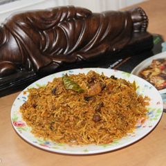 A picture of Kerala Style Mussels Biryani / Malabari Kadukka Biriyani.