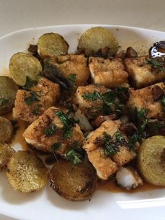 Una foto de Bacalao al ajillo