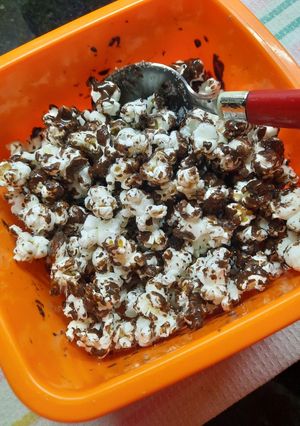 Una foto de Pochoclos con chocolate