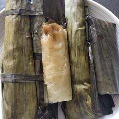 A picture of Sticky Rice in Banana Leaves.