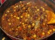 A picture of chili with kidney beans and chick peas