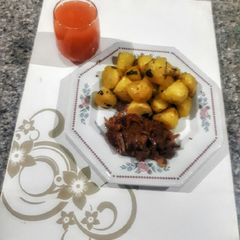 A picture of Boiled stir fried potatoes with chicken liver sauce.