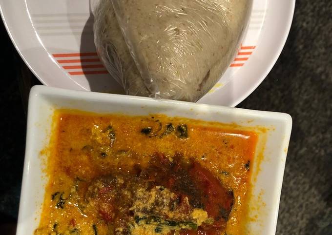 Egusi soup and cabbage swallow