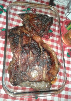 Una foto de Tapa de asado condimentado y cocinado en su propio jugo al horno
