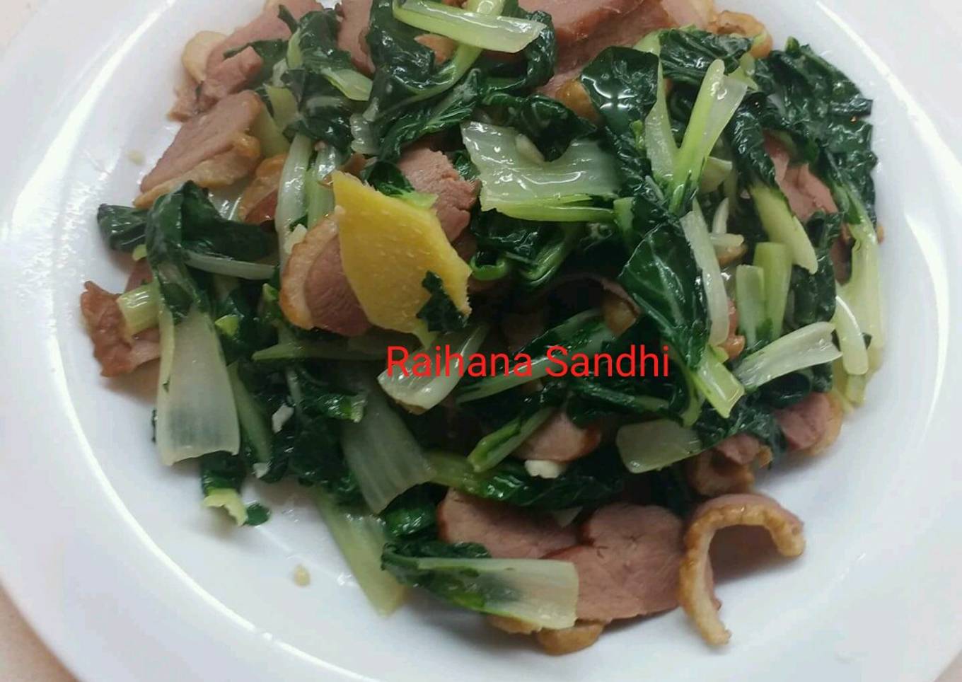 Tumis baby bokcoy dengan daging bebek asap