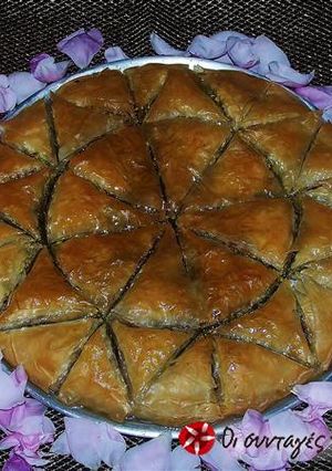 A picture of Baklava with pistachios.