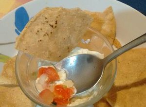 Una foto de Botana de pico de gallo.ॐ