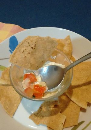 Una foto de Botana de pico de gallo.ॐ