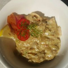 A picture of Creamy bacon and fish starter.