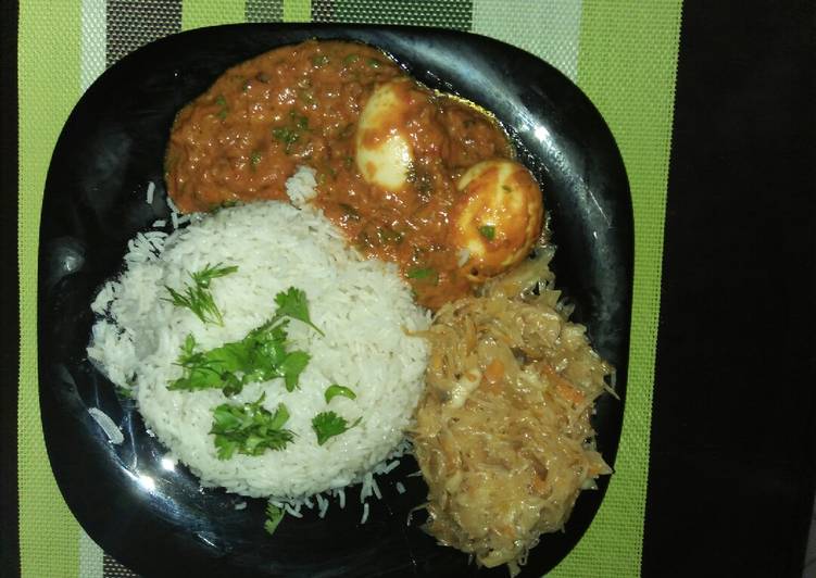 Rice,Egg Curry and cabbage