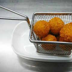 A picture of Potato and cheese croquet.