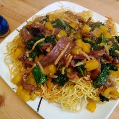 A picture of Beef chow mein with kale and sweet pepper.