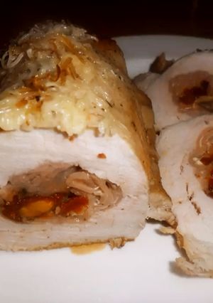 Foto principal de Lomo de cerdo relleno de jamón, tomatitos secos y champiñones