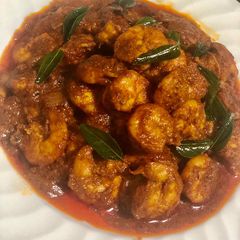 A picture of Ghee Roast Prawns.
