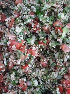 A picture of Tabbouleh with white quinoa seed.