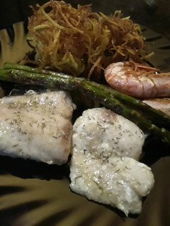 Una foto de Lomos de pescadilla confitados, al toque de romero