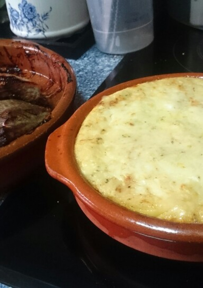 Una foto de Milhojas de patata al horno