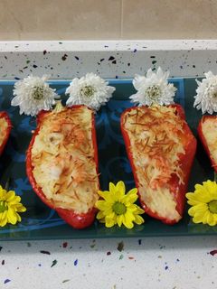 Una foto de Pimientos rellenos de arroz con langostinos