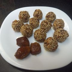 Dates crunchy bite/ laddu A picture of Dates crunchy bite/ laddu.