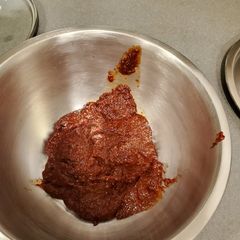 A picture of Gochujang (korean red pepper paste).