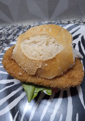 Una foto de Milanesa al pan