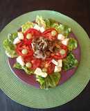 Ensalada de lechuga, tomate, mozzarella y champiñones