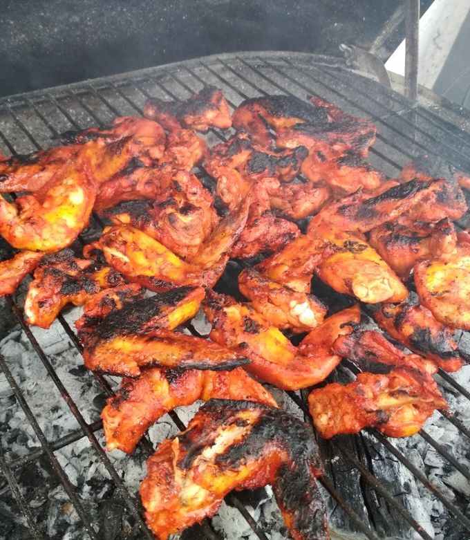 Una foto de Alitas asadas