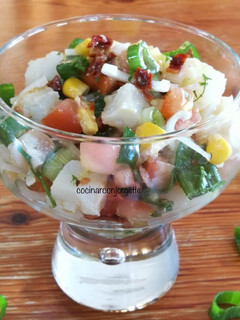 Una foto de Ceviche de bacalao con tomate secos y cebolleta