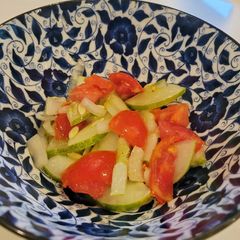 A picture of Cucumber and Tomato Salad.