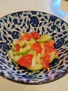 A picture of Cucumber and Tomato Salad.