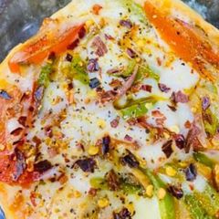 A picture of Cheesy uttpam Pizza.