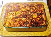 Una foto de lasagna de salmon