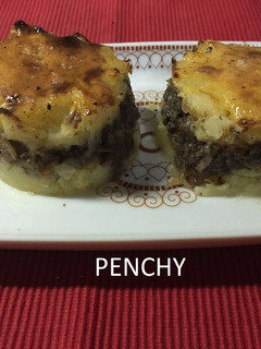 Una foto de Pastel de morcilla dorado
