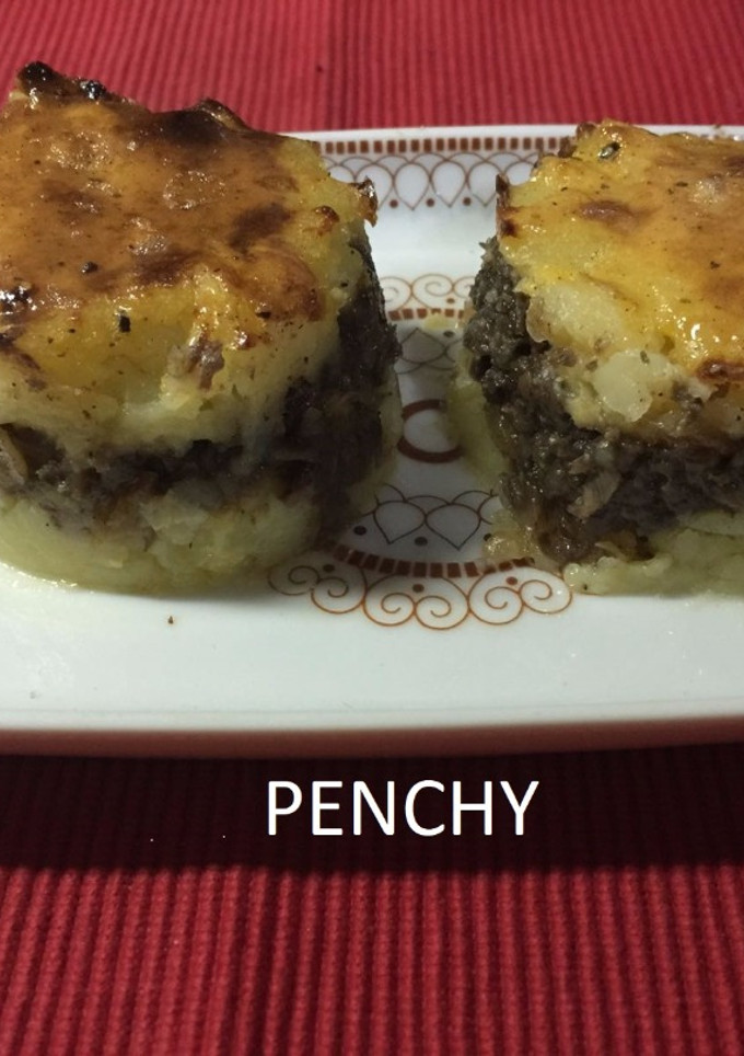 Una foto de Pastel de morcilla dorado