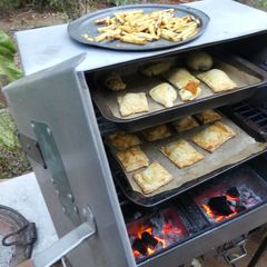A picture of Sweet potato with dhania and spinach and onion puff pastry's baked in the Cookswell jiko.