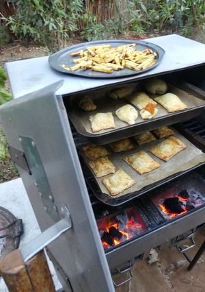 A picture of Sweet potato with dhania and spinach and onion puff pastry's baked in the Cookswell jiko.