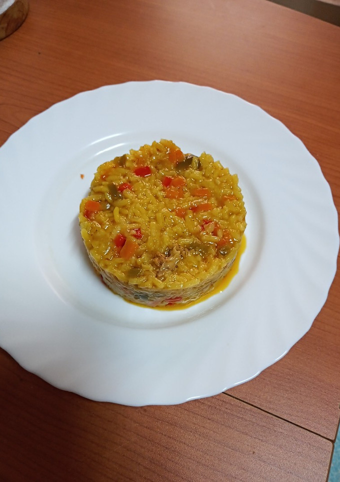 Una foto de Zócalo de arroz con cochino y verduras