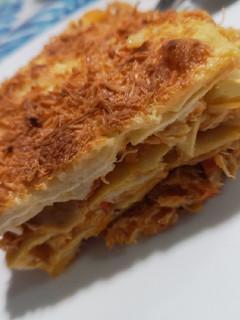 Una foto de Lasaña de pollo y bacon