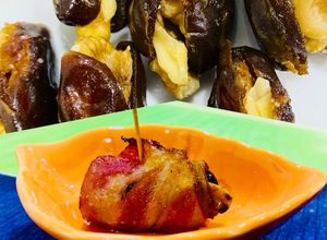 Hình của món Finger Food 👌2: Bacon - Ba rọi xông khói cuộn Chà Là nướng “Món bốc tay mới đúng điệu”.