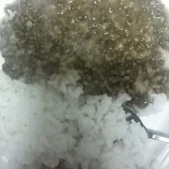 A picture of Stewed Green grams served with boiled rice.