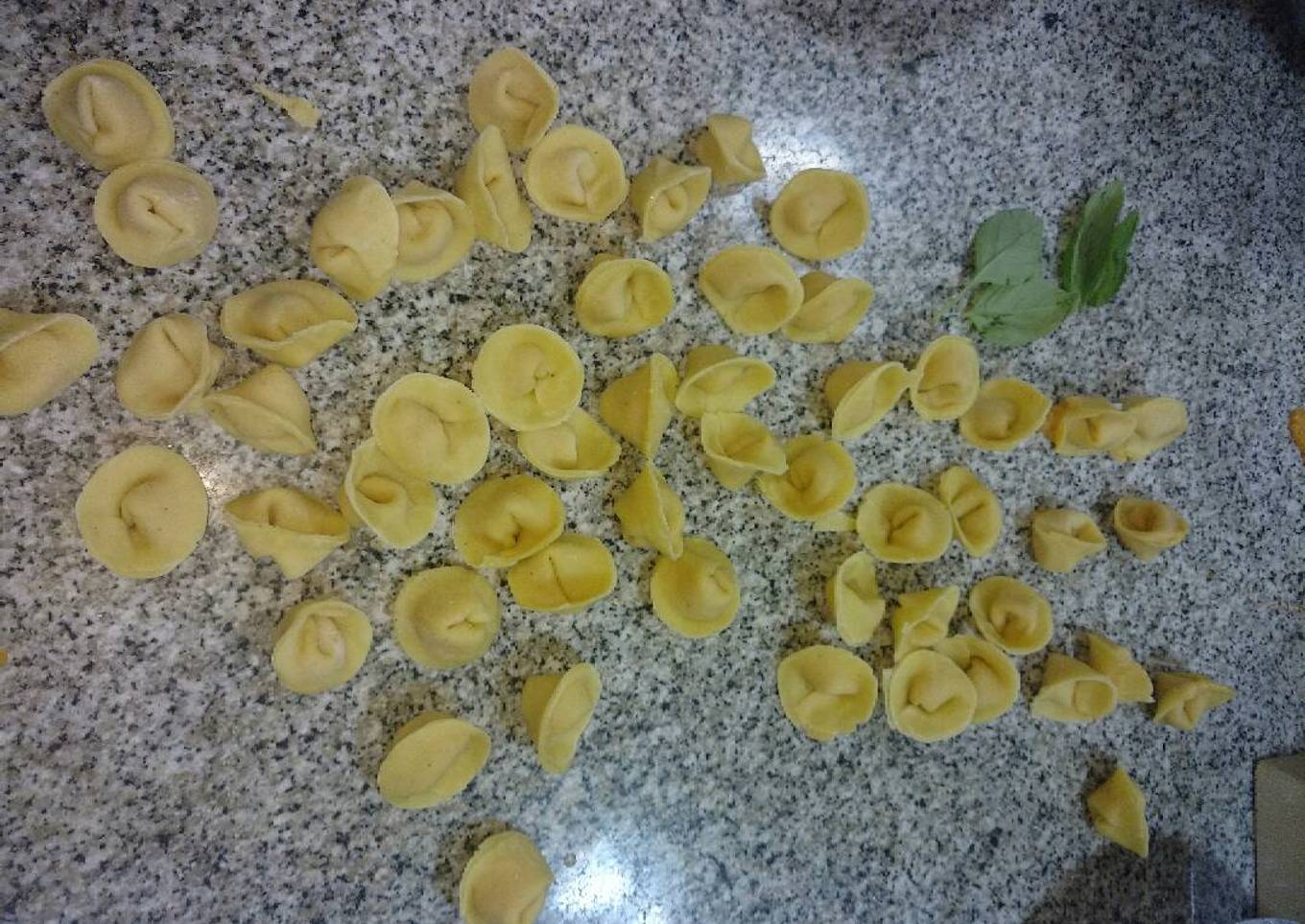Capelletti de calabaza sobre salsa concasse