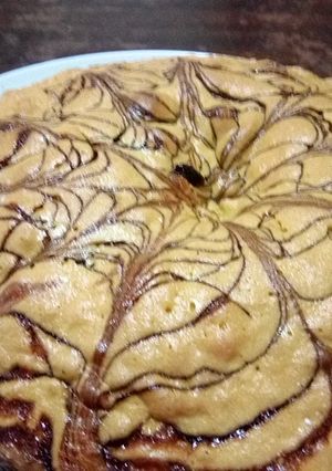 Una foto de Bizcochuelo de vainilla y salsa de chocolate