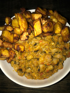 A picture of Title: Fish beans porridge garnished with fried plantain.