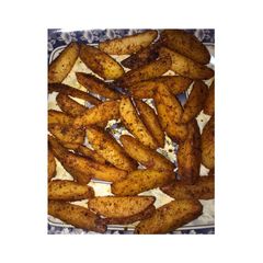 A picture of Spicy potato wedges.