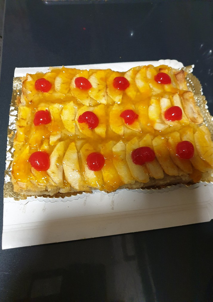 Una foto de Tarta de manzana con miel y cerezas