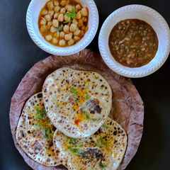 A picture of Amritsadi Kulche, Onion- Tamarind Chutney.