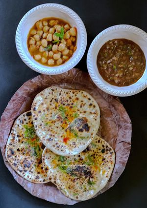 A picture of Amritsadi Kulche, Onion- Tamarind Chutney.