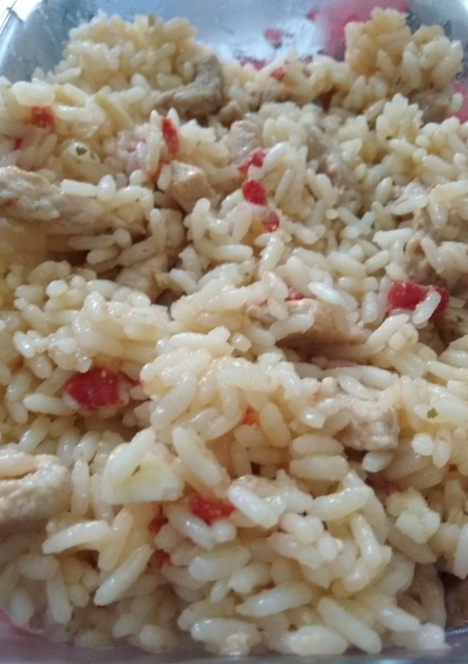Una foto de 🍚 Arroz con lomo