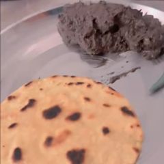 Sarson ka saag with makki ki roti A picture of Sarson ka saag with makki ki roti.